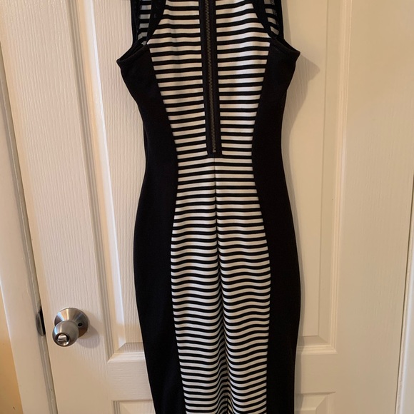 Black and White Form Fitting Material Girl Dress - Picture 3 of 10